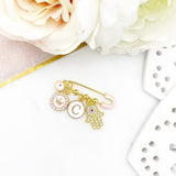 Personalised Pink Mini Evil Eye Baby Clothing Pin, Hamsa Hand, Crown, Letter